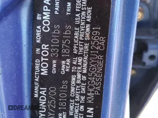 2000 Hyundai Accent z VIN KMHCG45GXYU125691, wystawiony jako Copart lot #87253294 z przebiegiem 91 062 mil mil oraz Szkoda całkowita • Salvage title. Historia ofert i sprzedaży dostępna na DreamBid. Obrazek 12.