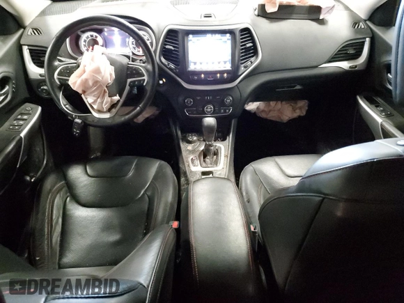 2018 Jeep Cherokee Trailhawk Leather Plus with VIN 1C4PJMBX4JD558201, listed as a Copart auction lot 53462775 with 94,604 mi miles and Salvage title. Bid and sale history available at DreamBid. Image 8.