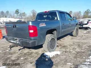 2009 Chevrolet Silverado 1500 LS with VIN 3GCEK13CX9G124152, listed as a IAAI auction lot 41224667 with 234,453 mi miles. Bid and sale history available at carsss.com. Image 4.
