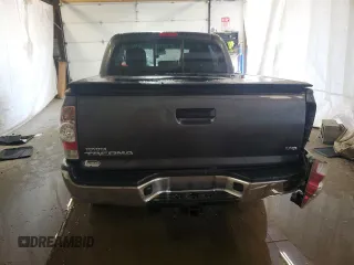 2013 Toyota Tacoma z VIN 5TFLU4ENXDX061110, wystawiony jako Copart lot #58910865 z przebiegiem Nie podano mil oraz Szkoda całkowita • Salvage title. Historia ofert i sprzedaży dostępna na DreamBid. Obrazek 6.
