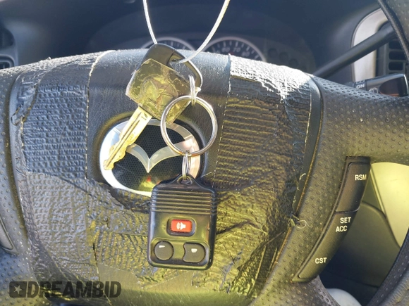 2003 Mazda Tribute LX with VIN 4F2YZ04183KM44733, listed as a IAAI auction lot 41472662 with 246,522 mi miles and . Bid and sale history available at DreamBid. Image 11.