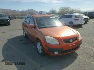 2009 Kia Rio SX with VIN KNADE223496514284, listed as a Copart auction lot 48550105 with 114,411 mi miles and Salvage Title. Bid and sale history available at carsss.com. Image 11.
