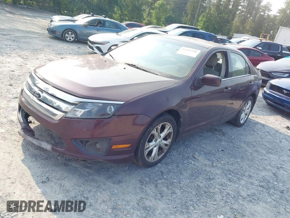 2012 Ford Fusion SE with VIN 3FAHP0HA5CR312983, listed as a IAAI auction lot 42399940 with 230,311 mi miles and . Bid and sale history available at DreamBid. Image 2.