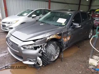 2015 Infiniti Q50 Premium z VIN JN1BV7ARXFM411040, wystawiony jako IAAI lot #41706295 z przebiegiem 97 297 mil mil oraz . Historia ofert i sprzedaży dostępna na DreamBid. Obrazek 17.