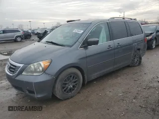 2010 Honda Odyssey EX-L with VIN 5FNRL3H70AB074894, listed as a Copart auction lot 84290404 with 179,894 mi miles and Salvage Title. Bid and sale history available at carsss.com. Image 1.