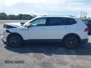 2024 Volkswagen Tiguan SE z VIN 3VV3B7AX3RM120298, wystawiony jako IAAI lot #41862454 z przebiegiem Nie podano mil oraz . Historia ofert i sprzedaży dostępna na DreamBid. Obrazek 14.