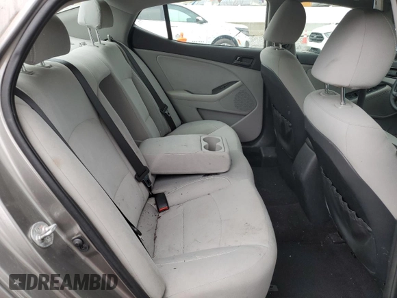 2013 Kia Optima LX z VIN 5XXGM4A70DG251868, wystawiony jako Copart lot #52921925 z przebiegiem 114 318 mil mil oraz Szkody całkowita. Historia ofert i sprzedaży dostępna na DreamBid. Obrazek 10.