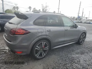 2014 Porsche Cayenne GTS с VIN WP1AD2A22ELA70950, выставлен на аукционе Copart как лот 48324015 с пробегом 75 310 миль миль и На запчасти • Non repairable. История ставок и продаж доступна на DreamBid. Изображение 3.