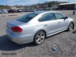 2013 Volkswagen Passat SEL Premium with VIN 1VWCM7A37DC024252, listed as a IAAI auction lot 41944978 with 168,616 mi miles. Bid and sale history available at carsss.com. Image 4.