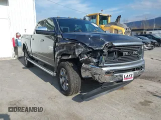 2016 Ram 2500 Laramie Longhorn with VIN 3C6UR5GLXGG330200, listed as a IAAI auction lot 40861684 with 79,427 mi miles and . Bid and sale history available at DreamBid. Image 6.