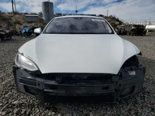 2016 Tesla Model S 90D with VIN 5YJSA1E27GF142380, listed as a Copart auction lot 50661905 with 104,865 mi miles and Salvage Title. Bid and sale history available at DreamBid. Image 5.