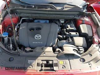 2020 Mazda CX-5 Touring with VIN JM3KFACMXL1819518, listed as a IAAI auction lot 41911679 with 50,357 mi miles and . Bid and sale history available at carsss.com. Image 10.