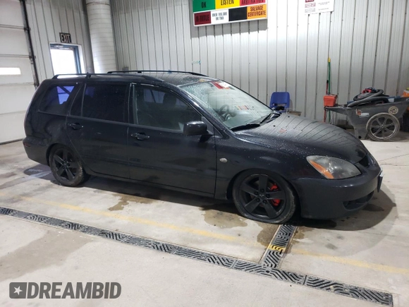 2004 Mitsubishi Lancer z VIN JA3AD29F44U024617, wystawiony jako Copart lot #51847765 z przebiegiem 172 585 mil mil oraz Szkoda całkowita • Salvage title. Historia ofert i sprzedaży dostępna na DreamBid. Obrazek 4.