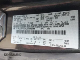 2016 Ford Escape SE with VIN 1FMCU9GX8GUB42944, listed as a IAAI auction lot 42171770 with 120,041 mi miles. Bid and sale history available at carsss.com. Image 9.