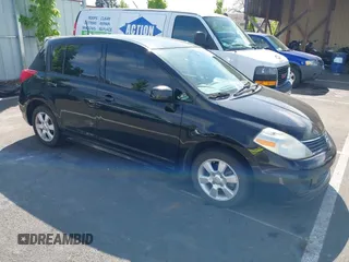 2009 Nissan Versa 1.8 SL with VIN 3N1BC13E99L409145, listed as a IAAI auction lot 42151530 with 150,930 mi miles. Bid and sale history available at carsss.com. Image 1.