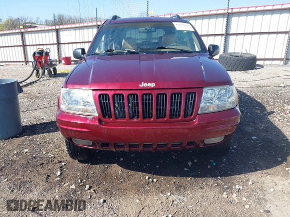 1999 Jeep Grand Cherokee Limited with VIN 1J4GW68N3XC770468, listed as a IAAI auction lot 41793600 with 65,277 mi miles. Bid and sale history available at carsss.com. Image 12.