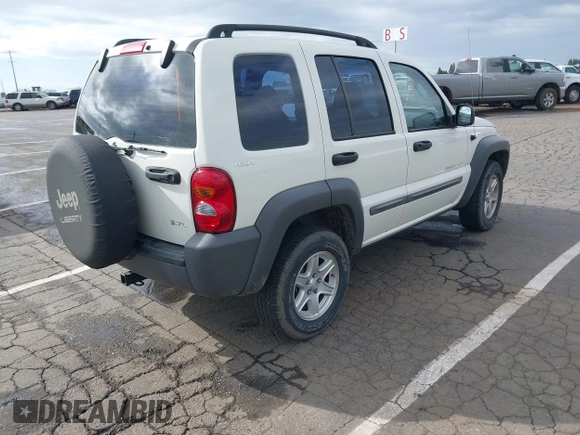 2002 Jeep Liberty Sport with VIN 1J4GL48K92W268896, listed as a IAAI auction lot 41915144 with 102,706 mi miles. Bid and sale history available at carsss.com. Image 4.
