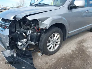 2017 Dodge Journey SXT z VIN 3C4PDDBG6HT595309, wystawiony jako IAAI lot #41918029 z przebiegiem 127 247 mil mil oraz . Historia ofert i sprzedaży dostępna na DreamBid. Obrazek 6.
