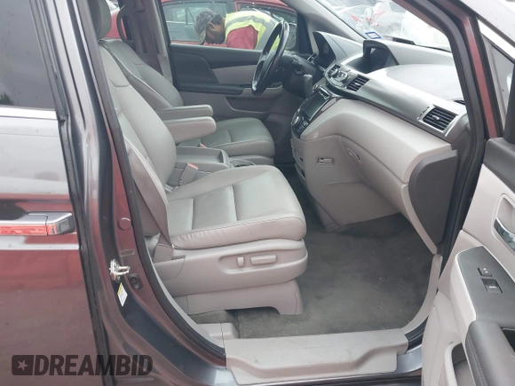 2016 Honda Odyssey Touring Elite with VIN 5FNRL5H96GB063176, listed as a IAAI auction lot 42157604 with 106,177 mi miles. Bid and sale history available at carsss.com. Image 5.