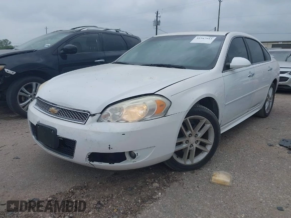 2012 Chevrolet Impala LTZ with VIN 2G1WC5E39C1224497, listed as a IAAI auction lot 41947943 with 210,726 mi miles and . Bid and sale history available at DreamBid. Image 1.
