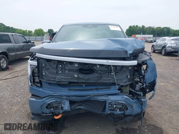 2023 Ford F-150 Lightning Pro with VIN 1FT6W1EVXPWG53591, listed as a IAAI auction lot 42249385 with 17,892 mi miles and . Bid and sale history available at DreamBid. Image 12.