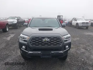 2021 Toyota Tacoma 4WD SR5 with VIN 3TMDZ5BN4MM099423, listed as a IAAI auction lot 41208397 with 62,935 mi miles. Bid and sale history available at carsss.com. Image 13.