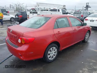 2009 Toyota Corolla with VIN JTDBL40E099075020, listed as a IAAI auction lot 41736322 with 211,111 mi miles. Bid and sale history available at carsss.com. Image 4.