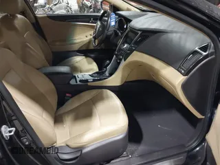 2012 Hyundai Sonata SE z VIN 5NPEC4AC9CH355351, wystawiony jako IAAI lot #42318588 z przebiegiem 122 864 mil mil oraz . Historia ofert i sprzedaży dostępna na DreamBid. Obrazek 5.