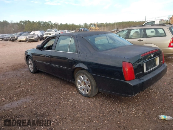 2002 Cadillac DeVille DTS with VIN 1G6KF57992U219921, listed as a IAAI auction lot 41261360 with 127,710 mi miles. Bid and sale history available at carsss.com. Image 3.