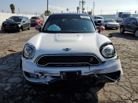 2019 MINI Countryman Cooper S с VIN WMZYT3C55K3E96002, выставлен на аукционе Copart как лот 43080985 с пробегом Не указан миль и Списание • Salvage title. История ставок и продаж доступна на DreamBid. Изображение 5.