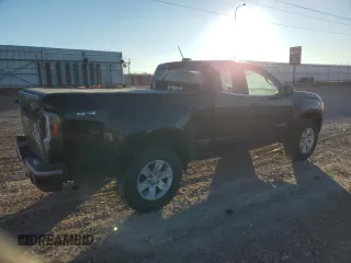 2015 GMC Canyon 4WD SLE with VIN 1GTH6BE37F1133213, listed as a Copart auction lot 82404014 with 142,149 mi miles and Salvage Title. Bid and sale history available at carsss.com. Image 3.