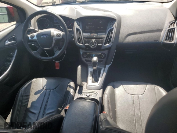 2014 Ford Focus Titanium z VIN 1FADP3N29EL409568, wystawiony jako Copart lot #62295345 z przebiegiem 53 401 mil mil oraz Szkoda całkowita • Salvage title. Historia ofert i sprzedaży dostępna na DreamBid. Obrazek 8.