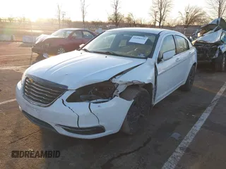 2013 Chrysler 200 LX with VIN 1C3CCBAB2DN559529, listed as a IAAI auction lot 41490534 with 123,468 mi miles. Bid and sale history available at carsss.com. Image 6.