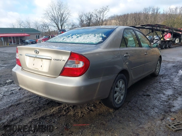 2003 Toyota Camry LE with VIN 4T1BE30K13U705105, listed as a IAAI auction lot 41696395 with 191,389 mi miles and . Bid and sale history available at DreamBid. Image 4.