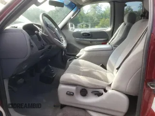 2003 Ford F-150 XL с VIN 1FTRX18LX3NA80535, выставлен на аукционе Copart как лот 61839854 с пробегом 291 397 миль миль и Списание • Salvage title. История ставок и продаж доступна на DreamBid. Изображение 7.
