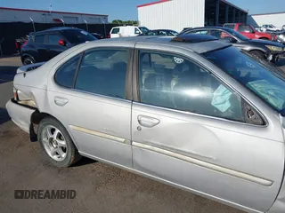 1999 Nissan Altima XE with VIN 1N4DL01D4XC252973, listed as a IAAI auction lot 42005504 with 247,570 mi miles. Bid and sale history available at carsss.com. Image 16.