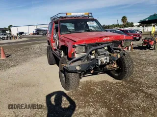 1996 Jeep Cherokee Sport with VIN 1J4FJ67S2TL167992, listed as a Copart auction lot 81329654 with 148,031 mi miles and Non Repairable. Bid and sale history available at carsss.com. Image 12.
