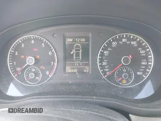 2012 Volkswagen Passat SE z VIN 1VWBP7A32CC077832, wystawiony jako IAAI lot #40637993 z przebiegiem 146 698 mil mil oraz . Historia ofert i sprzedaży dostępna na DreamBid. Obrazek 7.