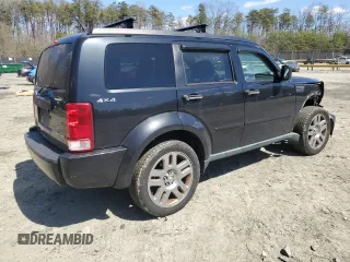 2011 Dodge Nitro Heat z VIN 1D4PU4GK7BW605931, wystawiony jako Copart lot #50860885 z przebiegiem 149 697 mil mil oraz Szkoda całkowita • Salvage title. Historia ofert i sprzedaży dostępna na DreamBid. Obrazek 3.