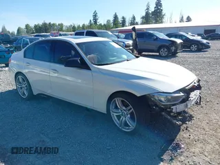 2013 BMW 3 Series 335i with VIN WBA3A9G5XDNP36238, listed as a IAAI auction lot 42347821 with 97,227 mi miles and . Bid and sale history available at DreamBid. Image 1.