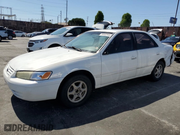 1997 Toyota Camry LE z VIN JT2BG22K9V0002215, wystawiony jako Copart lot #56932955 z przebiegiem 265 776 mil mil oraz Szkoda całkowita • Salvage title. Historia ofert i sprzedaży dostępna na DreamBid. Obrazek 1.
