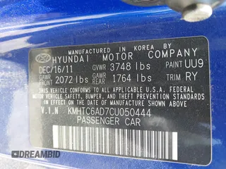 2012 Hyundai Veloster w/Gray Int with VIN KMHTC6AD7CU050444, listed as a IAAI auction lot 42170272 with 121,478 mi miles and . Bid and sale history available at DreamBid. Image 9.