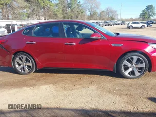 2019 Kia Optima LX z VIN 5XXGT4L3XKG366522, wystawiony jako IAAI lot #41805592 z przebiegiem 65 859 mil mil oraz . Historia ofert i sprzedaży dostępna na DreamBid. Obrazek 14.