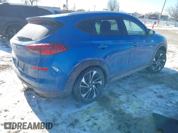 2019 Hyundai Tucson Sport with VIN KM8J33ALXKU857925, listed as a IAAI auction lot 41369786 with 41,365 mi miles. Bid and sale history available at carsss.com. Image 4.