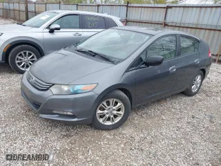2010 Honda Insight EX with VIN JHMZE2H7XAS024879, listed as a IAAI auction lot 42029553 with 187,648 mi miles. Bid and sale history available at carsss.com. Image 2.