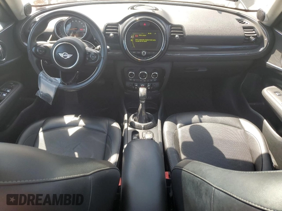 2016 MINI Clubman z VIN WMWLN5C53G2E29697, wystawiony jako Copart lot #52791585 z przebiegiem 115 213 mil mil oraz Tytuł czysty. Historia ofert i sprzedaży dostępna na DreamBid. Obrazek 8.