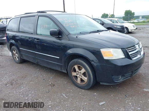 2009 Dodge Grand Caravan SXT z VIN 2D8HN54109R596185, wystawiony jako IAAI lot #42382133 z przebiegiem 207 882 mil mil oraz . Historia ofert i sprzedaży dostępna na DreamBid. Obrazek 1.