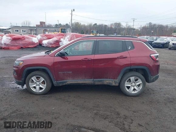 2022 Jeep Compass Latitude with VIN 3C4NJDBB7NT206323, listed as a IAAI auction lot 42038930 with 84,976 mi miles and . Bid and sale history available at DreamBid. Image 14.