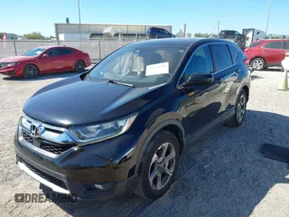 2017 Honda CR-V EX with VIN 7FARW1H52HE000353, listed as a IAAI auction lot 41824218 with 91,204 mi miles. Bid and sale history available at carsss.com. Image 2.