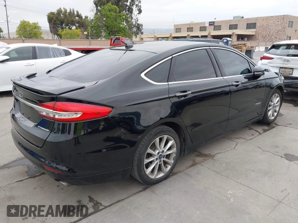 2017 Ford Fusion Titanium with VIN 3FA6P0SUXHR110304, listed as a IAAI auction lot 42119565 with 118,706 mi miles and . Bid and sale history available at DreamBid. Image 4.